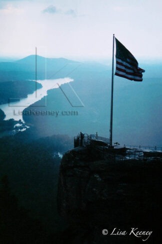 Photo of Chimney Rock and flag.