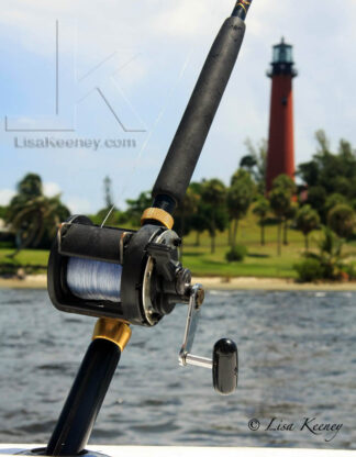 Photo of fishing near lighthouse.