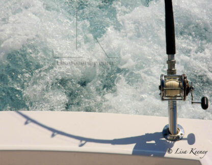 Photo of fishing boat and reel.