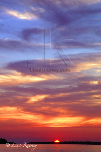 Photo of sunset on water.