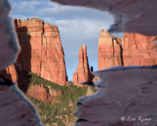 Photo of Sedona reflected in a puddle.