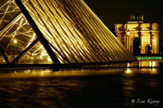 Photo of Louvre and Arc.